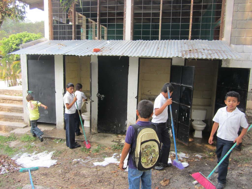 schoolchildren help with cleaning